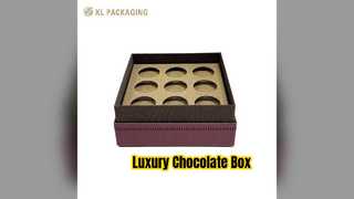 Luxuriöse Schokoladenschachtel in lila Geschenkverpackung