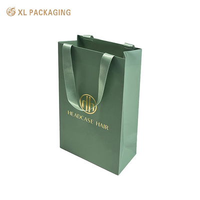 kaufen Custom Design Printed Shopping Geschenkverpackung Papiertüte mit Ihrem eigenen Logo Luxus grünes Band Dicke Papiertüte für Kleidung online manufacture