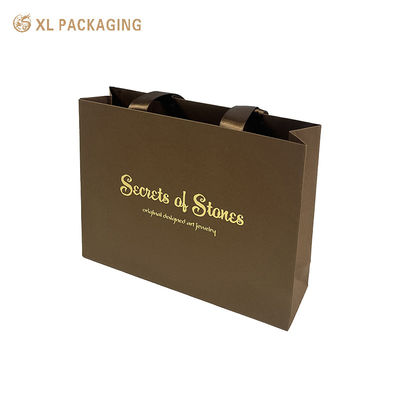 Custom Kraftpapier-Einkaufstasche mit Goldfolie-Logo-Druck und verstärkte Konstruktion für Schmuckverpackungen