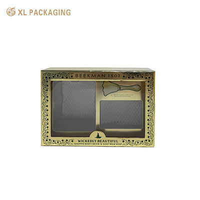 Maßgeschneiderte goldene, starre zweiteilige Geschenkbox mit PET-Fenster, 2-mm-Graupappe-Hautpflegeset-Verpackungsbox für Körperlotionseife mit PET-Einsatz