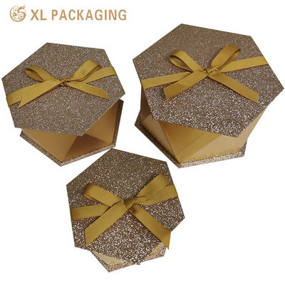 Benutzerdefinierte sechseckige starre Schokoladen-Geschenkbox mit 1,5 mm Karton und goldenem Glitzer-Spezialpapier für die Verpackung zum Valentinstag
