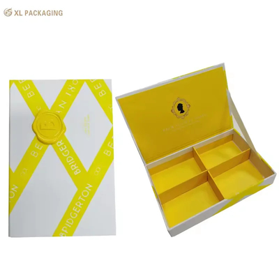 Yellow Velvet Finish Resin Logo Cosmetic Paper Box with Magnetic Closure and 4-Compartment Design für Hautpflege-Verpackungen
